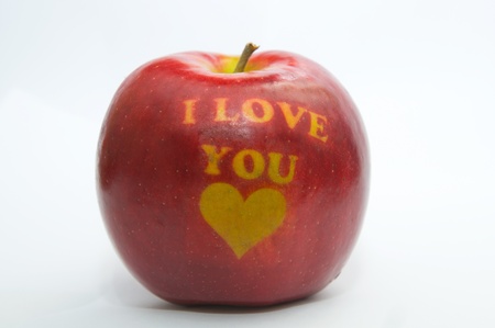 An apple with the inscription about loveの写真素材