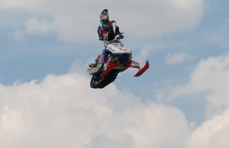 RUSSIA, MOSCOW-JULY 13: Daniel Bodin (Belgium) on a snowmobile at the sports festival "Moscow City Games 2013" in the program Moto Freestyle (FMX) in Moscow, Arena "Luzhniki»; on July 13, 2013のeditorial素材