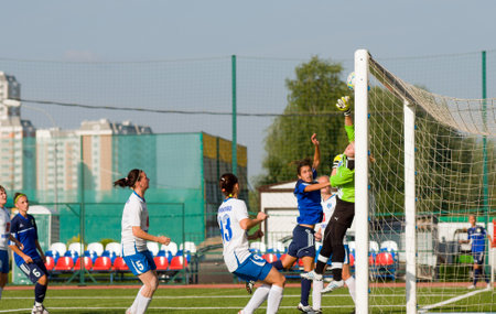 MOSCOW - AUGUST 18 Unidentified players in action on game Kubanochka vs CSP Izmailovo on Russian tournament of wemen football league on August 18, 2013, in Moscow, Russiaのeditorial素材