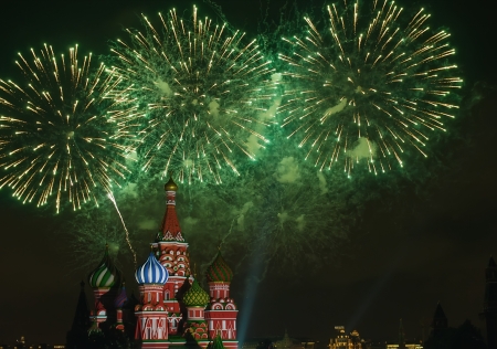 Fireworks explode over St  Basil Cathedral at night in Red Square in Moscow, Russia 