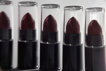 Lipsticks In A Row Isolated Over Gray Backgroundの写真素材