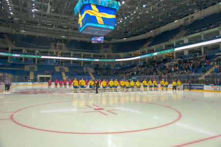 MOSCOW - JANUARY 29, 2016: Player listening to national anthems on hockey game Sweden vs Czech...
