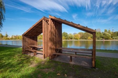 Garden furniture for relaxing in the park by the lakeの写真素材