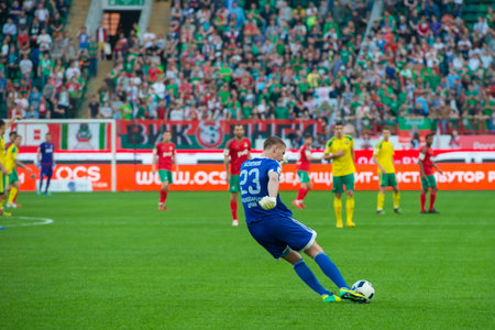 MOSCOW - MAY 11, 2016: Goalkeeper Alexander Belov (23) in action during the soccer game Russian Premier League Lokomotiv (Moscow) vs Kuban (Krasnodar), the stadium Lokomotiv Moscow, Russia. Lokomotiv lost 0: 1のeditorial素材