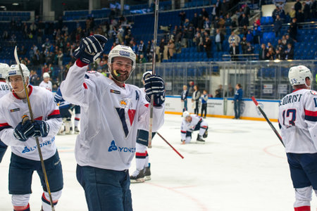 MOSCOW, RUSSIA - OCTOBER 12, 2016: Slovan team rejoice on hockey game Dynamo (Moscow) vs Slovan (Bratislava) on Russia KHL championship in VTB Arena Ice Palace Moscow, Russia. Slovan won 5: 3のeditorial素材