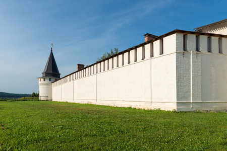 Fortress wall and tower in Ensemble of the Starytsky Svyato-Uspensky Monastery in city Staritsa,...