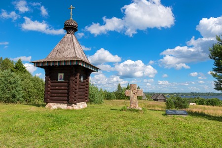 Wayside cross and chapel. Tver region, Russia. On the way from Varangians to Greeksの写真素材