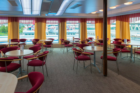 Panorama of bar-restaurant aboard the Cruise Ship. Ships bar has panoramic windows and bar for relaxation.のeditorial素材