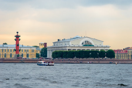 RUSSIA, SAINT PETERSBURG - AUGUST 18, 2017:  Landmarks of Vasilievsky island spit - rostral column and old stock exchange building. Urban landscape of St Petersburg, Russiaのeditorial素材