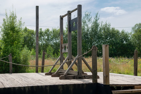 Moscow region, Film City Piligrim Porto, August 5, 2020: Empty scaffold with a place for execution and wooden gallows. Architecture houses of the European middle ages, Wooden scenery of the old city for filming feature filmsのeditorial素材