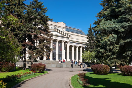 Moscow, Russia - May 10, 2021: View of The Fine Arts museum named after Pushkin (Pushkin's Museum) in Moscow city center. People stay in queue to visit the museum. A popular touristic landmark.のeditorial素材