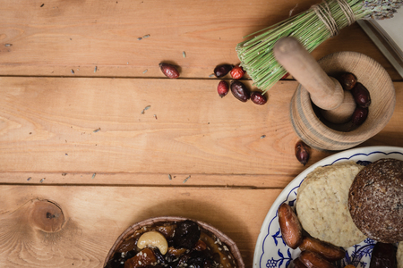 blueberry and pecan pie on wooden saucerの写真素材