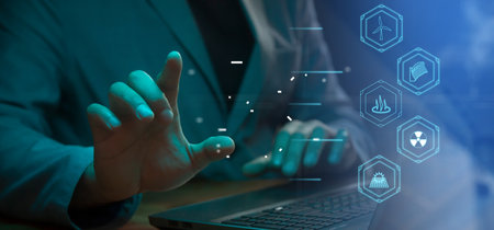 CG tech collage. Against the background of a silhouette of an employee with a laptop with icons with...