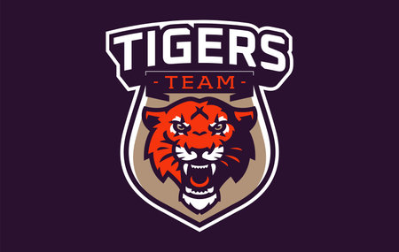 Sports logo with tiger mascot. Colorful sport emblem with tiger mascot and bold font on shield background. Logo for esport team, athletic club, college team. Isolated vector illustrationのイラスト素材
