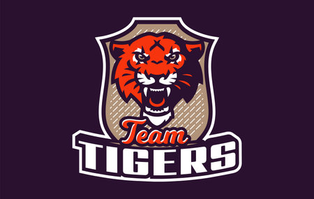Sports logo with tiger mascot. Colorful sport emblem with tiger mascot and bold font on shield background. Logo for esport team, athletic club, college team. Isolated vector illustrationのイラスト素材