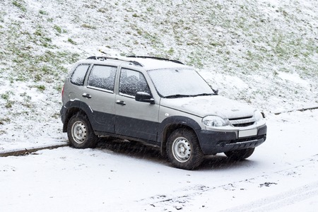 Snow on cars after snowfallの写真素材