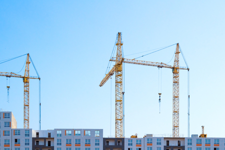 Cranes on blue skyの写真素材