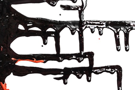 Flows of black and red paintの写真素材