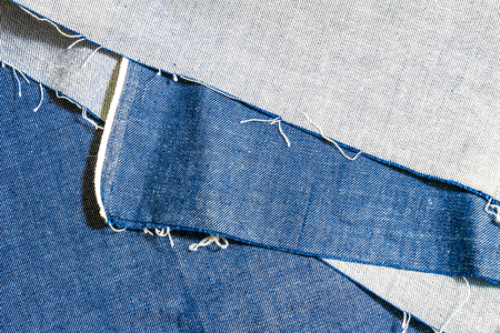Cut blue denim fabricの写真素材