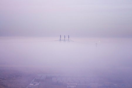 Fog covers electrotowersの写真素材