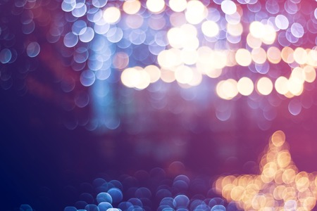 Blurry garlands with bokeh. Christmas lights in the windowsの写真素材