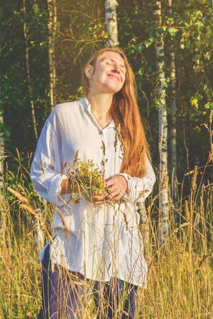 The girls portrait in the fieldの写真素材