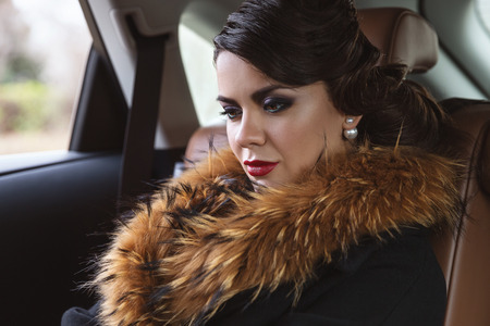 Glamorous lady in the car