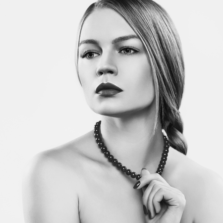 A woman with a necklace.の写真素材