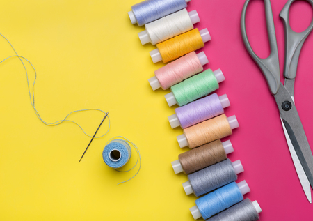 On bright background set of accessories for sewing. Close-up, copy space.の写真素材