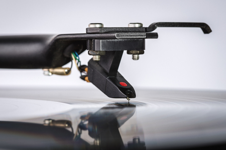 Vinyl plate, close-up. Tonorms with background cartridge. Copy space.の写真素材
