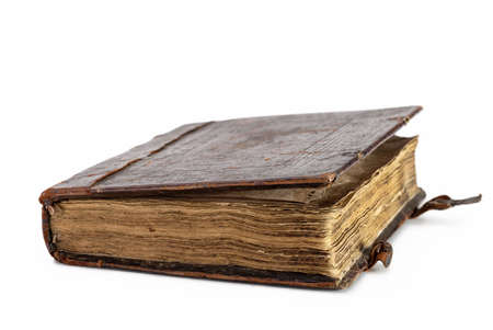 An open old book, in a brown leather case with a lock. Close-up, in isolation.の写真素材