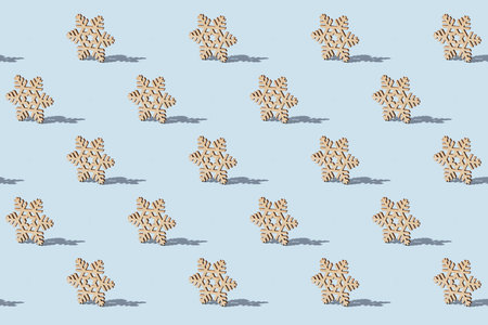 Pattern of Christmas snowflakes on a blue background. Merry Christmas.