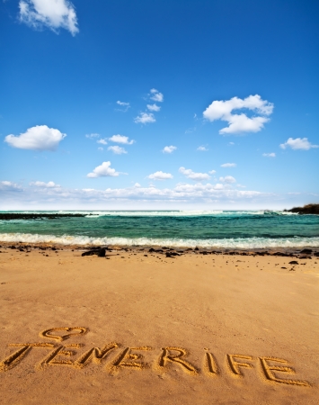 beach sand with written word  Tenerife and oceanの写真素材