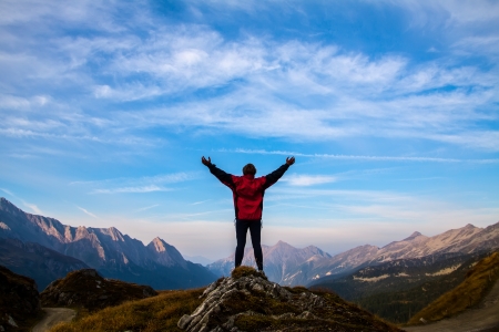 silhouette of sport women on the top of mountainの写真素材