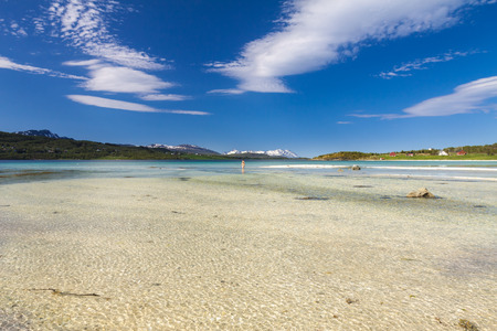 Picturesque sandy beach on Lofoten islands in Norway on sunny summer dayの写真素材