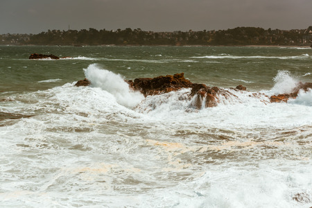 big waves crashing on rocks, Bretagne, Franceの写真素材