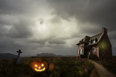Apocalyptic Halloween scenery with old house pumpkinの写真素材