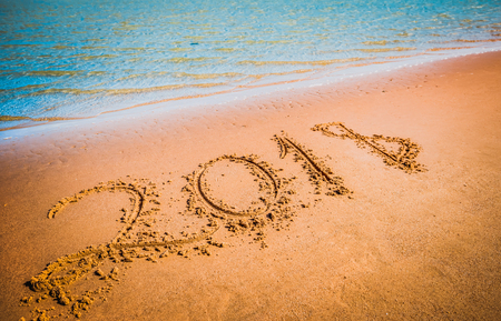 Happy New Year 2018 coming concept. Digits on sand beachの写真素材