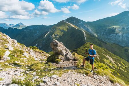 sporty man hiker on top of mountain, Tatryの写真素材