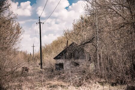 Building of abandoned kindergarten in destroyed village of Kopachi 10-km Chernobyl NPP alienation zone, Ukraineの写真素材