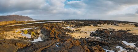 Incredible low tide coastside of Atlantic Ocean Lanzarote Canary Islands Spainの写真素材