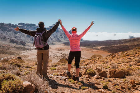 sporty couple on top of mountain. Tenerife Canaryの写真素材