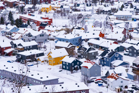 Norwegian town of Troms in the winter. Snowy arctic city with colorful houses and portの写真素材