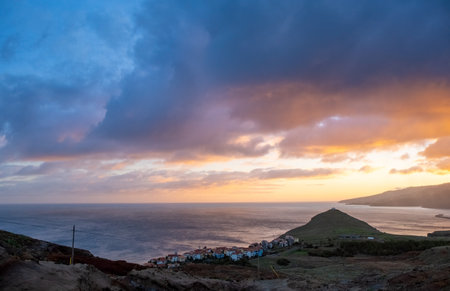 Sunset on Ponta de Sao Lourenco peninsula with small traditional village. Madeira Island Portugal.の写真素材
