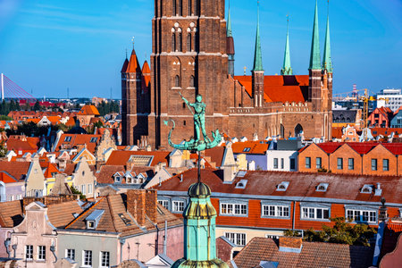 Cityscape aerial view on the old town with saint Marys church on the sunset in Gdansk, Poland