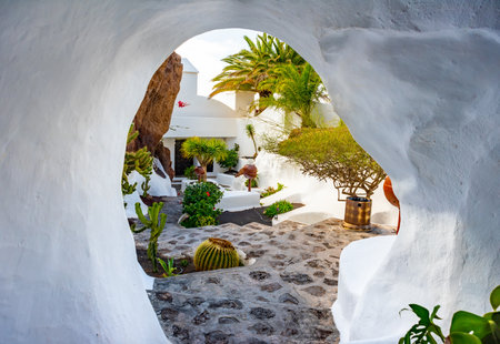 Nazaret, Lanzarote, Canary Islands, Spain - March 23, 2024: Lagomar museum or Casa Omar Sharif with cactus garden and pools, built into rock caves by Cesar Manriqueのeditorial素材