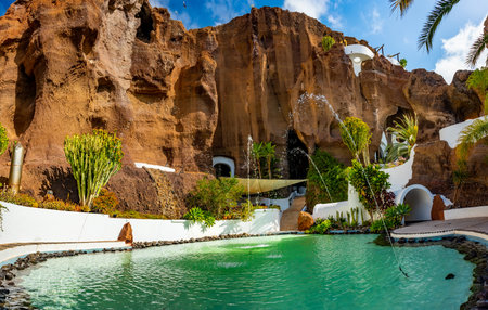 Nazaret, Lanzarote, Canary Islands, Spain - March 23, 2024: Lagomar museum or Casa Omar Sharif with cactus garden and pools, built into rock caves by Cesar Manriqueのeditorial素材