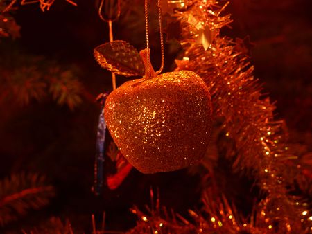 Close-up apple on a christmas treeの写真素材