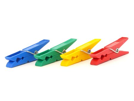 Colored clothes-peg isolated on whiteの写真素材