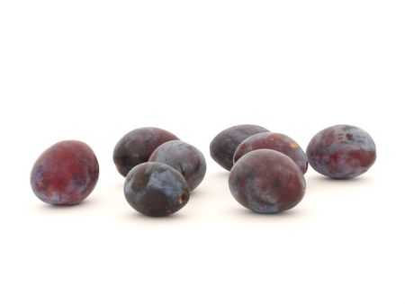 Purple plums isolated on whiteの写真素材